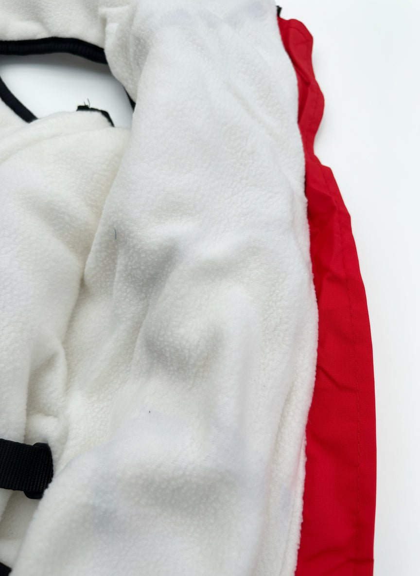 close up of fleece lining of red dog jacket with integrated harness