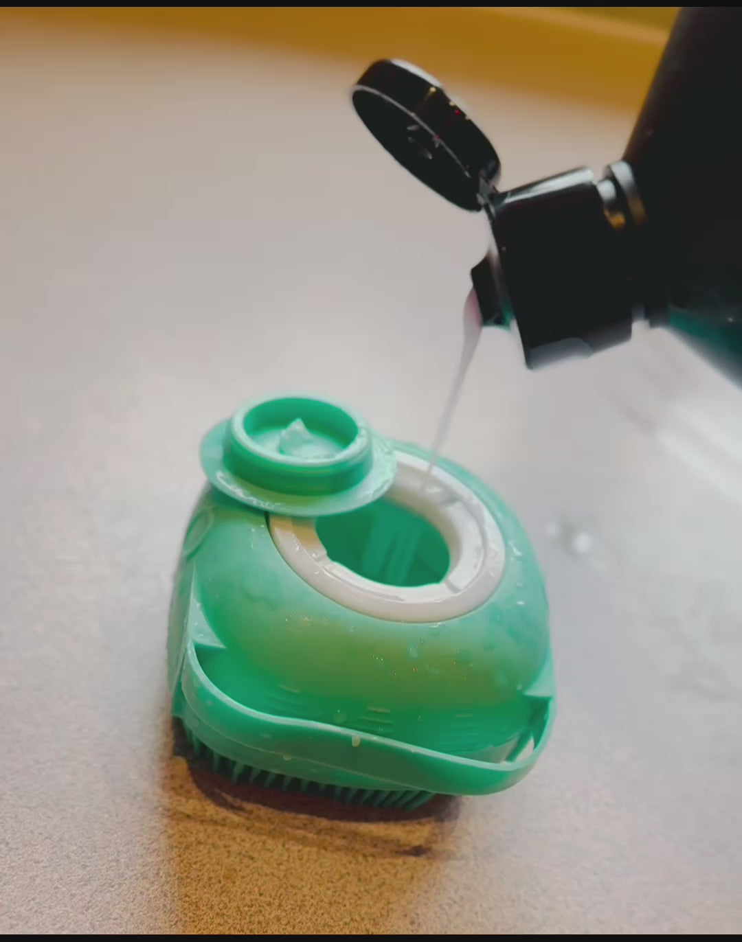 dog bath massage brush with dog shampoo inside